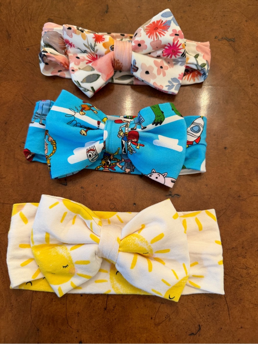 Little sleepies bow bundle sun, Toy Story and mauve meadow